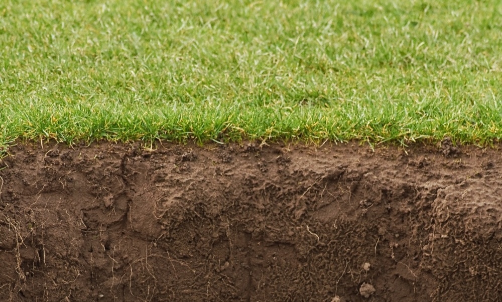 Aerating compacted online soil